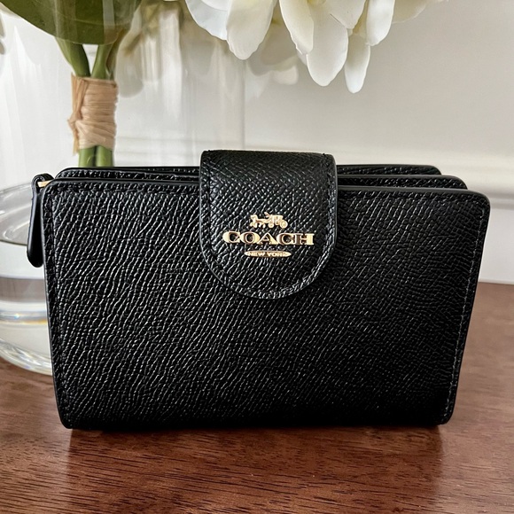 Coach Handbags - Coach Black & Gold Leather Medium Corner Zip Wallet EUC 🖤